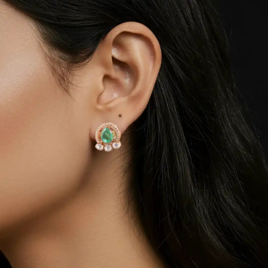 Emerald and diamond stud earring in rose gold, elegant women's jewelry with green gemstone accent