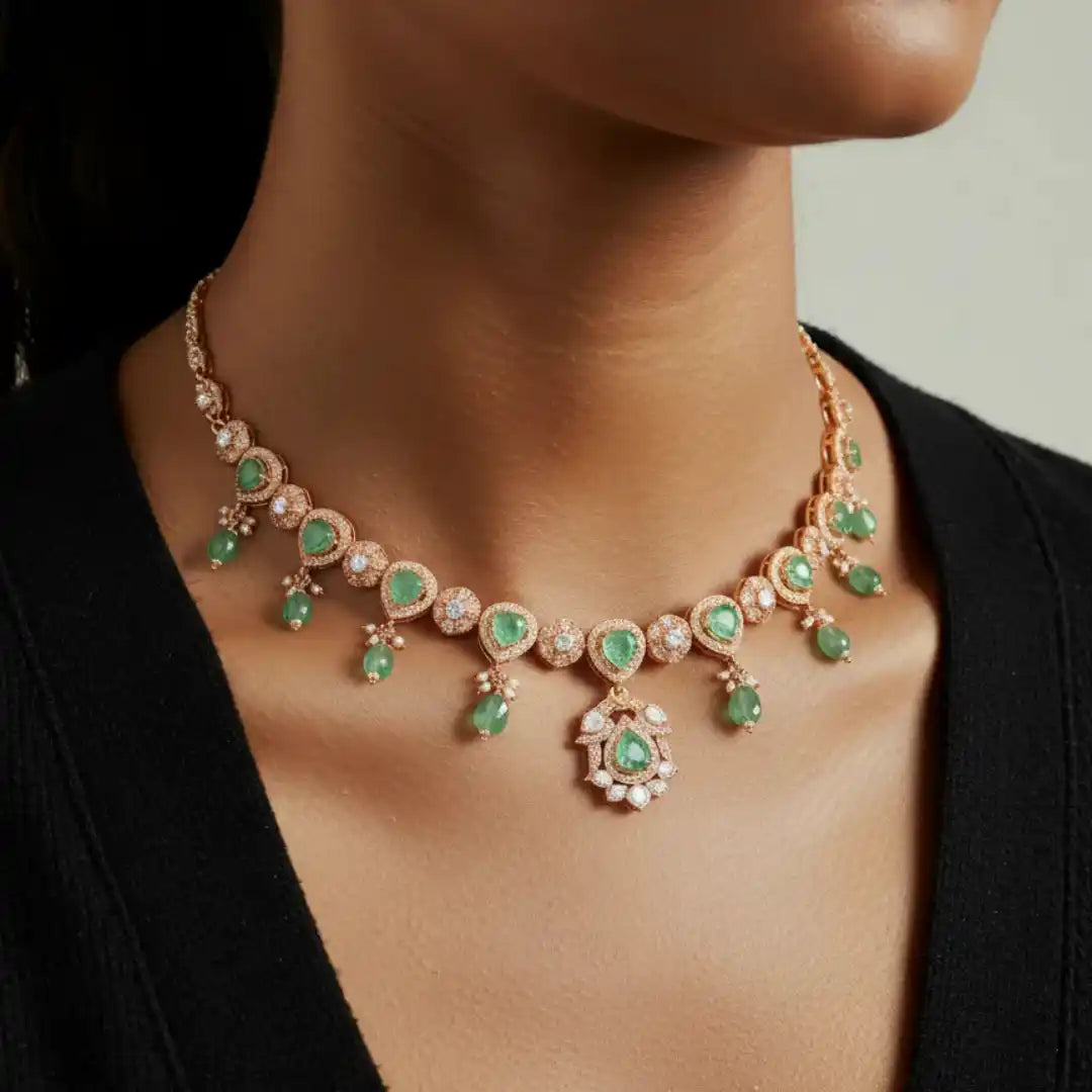 Elegant emerald and diamond necklace with rose gold detailing, perfect for luxury occasions.