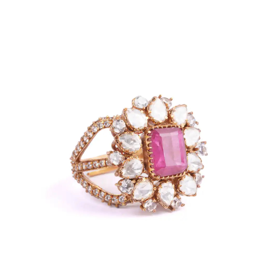 Elegant gold ring with pink gemstone and diamond accents, perfect for luxury jewelry lovers.