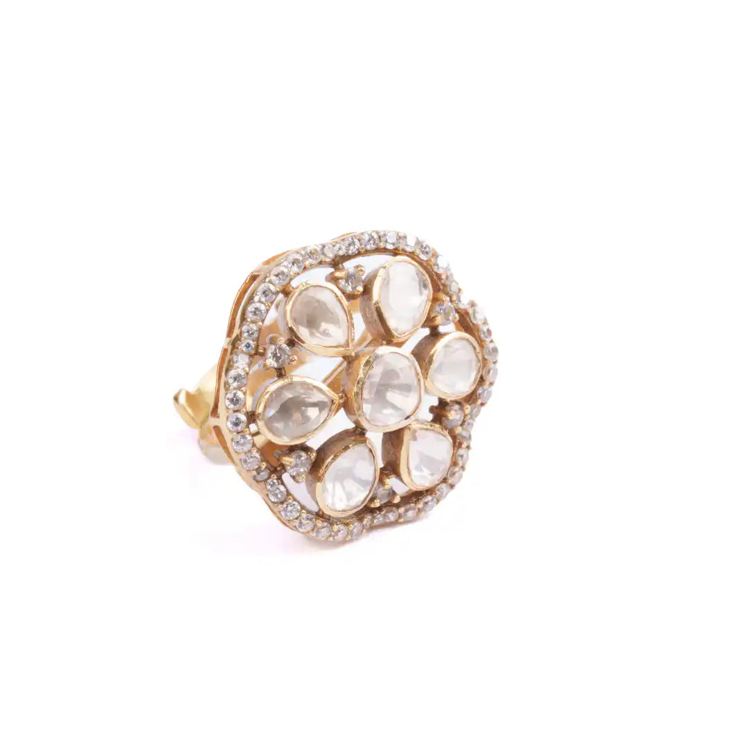 Elegant gold ring with floral design, featuring white gemstones and diamond accents, perfect for women's fashion jewelry.
