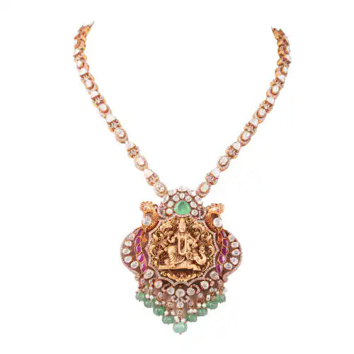 Elegant silver pendant necklace with Lord Ganesha motif, emerald accents, and diamond detailing