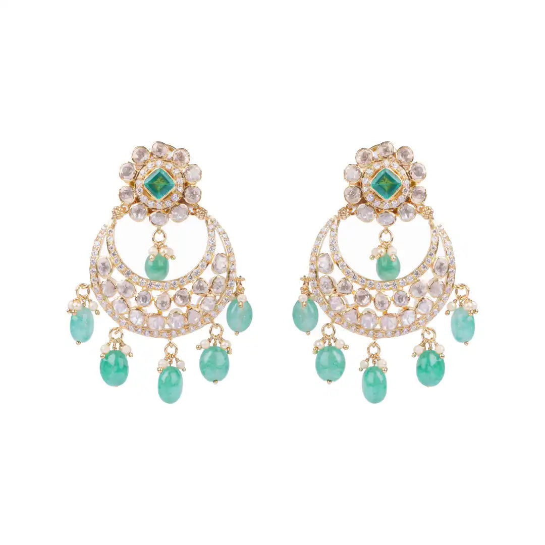 Elegant gold-tone chandelier earrings with green gemstones and crystal accents, perfect for traditional or festive wear.