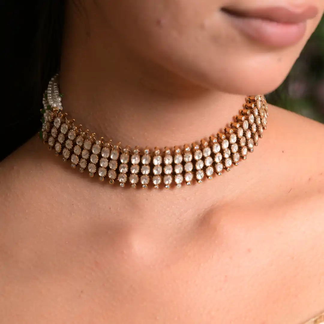 Elegant silver choker necklace with sparkling stones, perfect for traditional and festive wear.