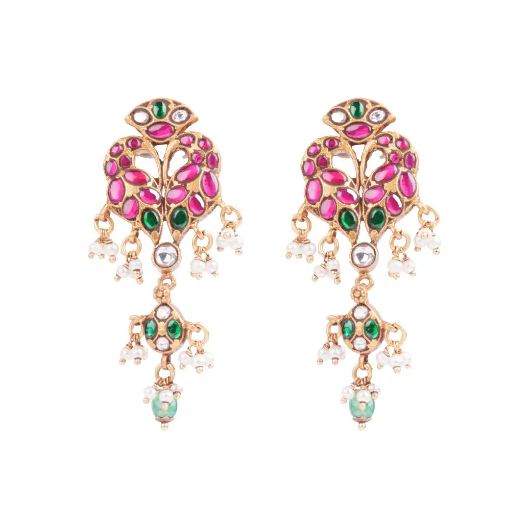 Gold-plated earrings with pink, green stones and pearl drops, traditional Indian jewelry design