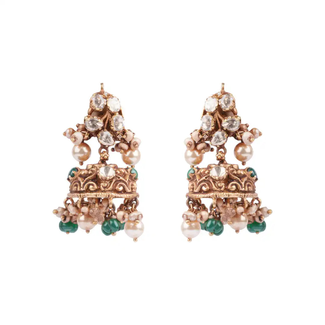 Traditional jhumka earrings with pearls, green beads, and clear stones on gold-tone metal