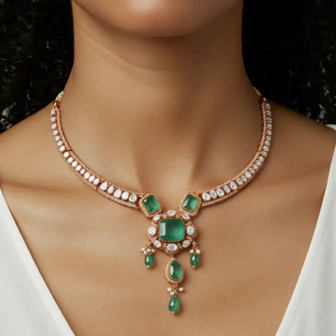 Elegant emerald and diamond necklace with rose gold detailing, perfect for luxury occasions.
