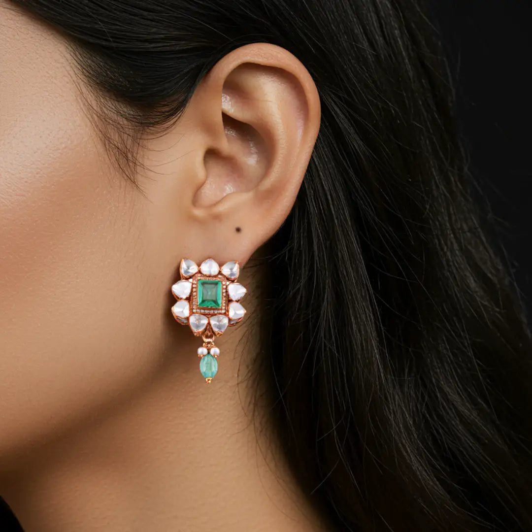 Emerald and pearl drop earring with rose gold finish, elegant traditional jewelry design