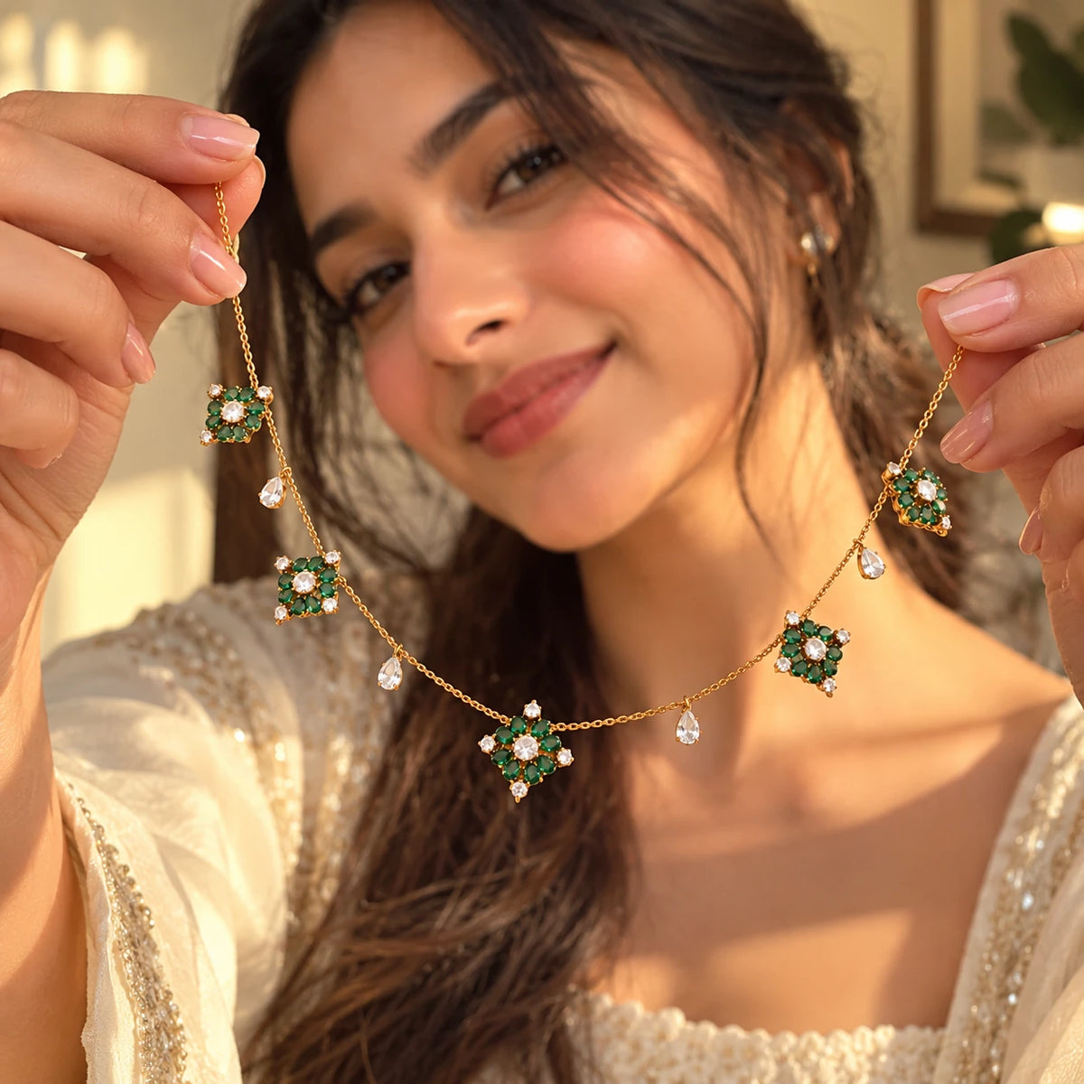 Gajaah 925 sterling silver emerald pendant necklace with green gemstone and crystal halo, showcasing elegant jewelry design.